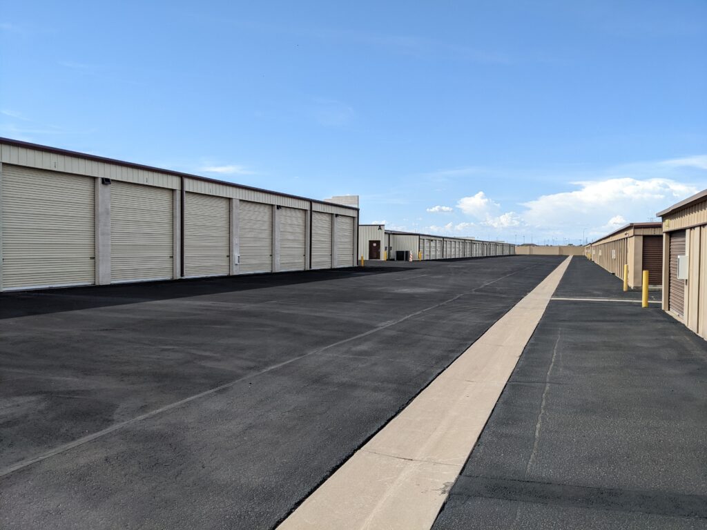 A wide aisle at River Crossing Avondale Storage & RV