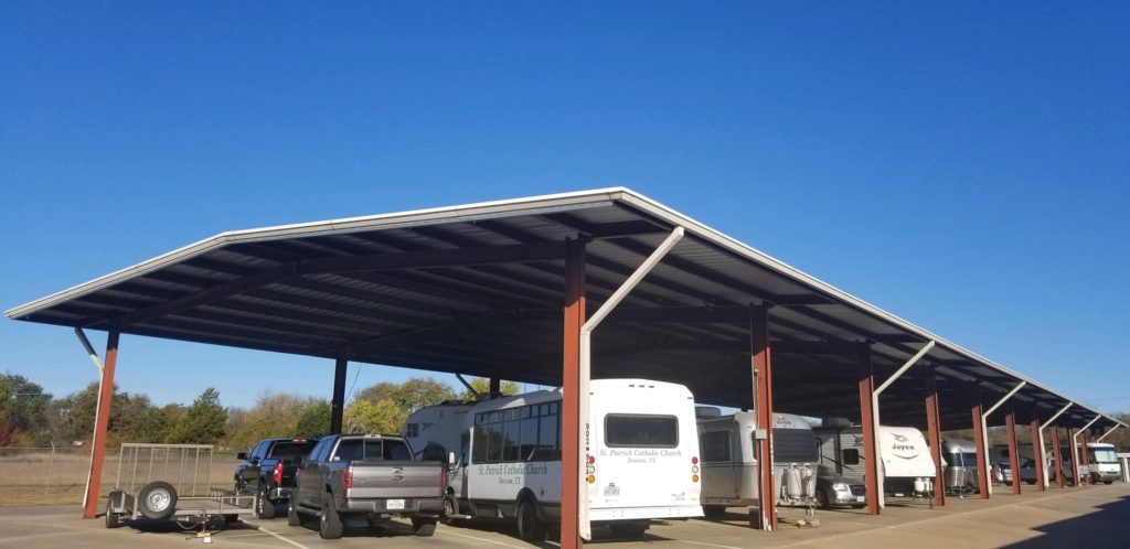 An area of covered outdoor parking for trucks, RVs, trailers, and boats