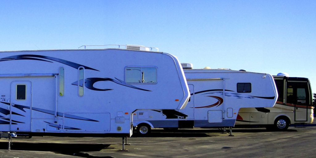 RVs parked next to each other outside