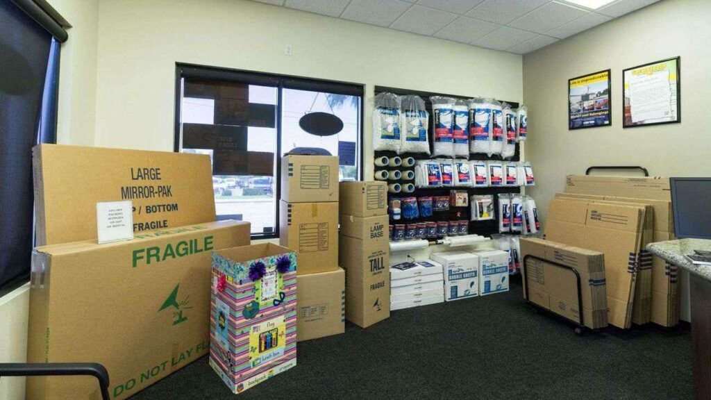 Inside facility office with moving and packing supplies for sale