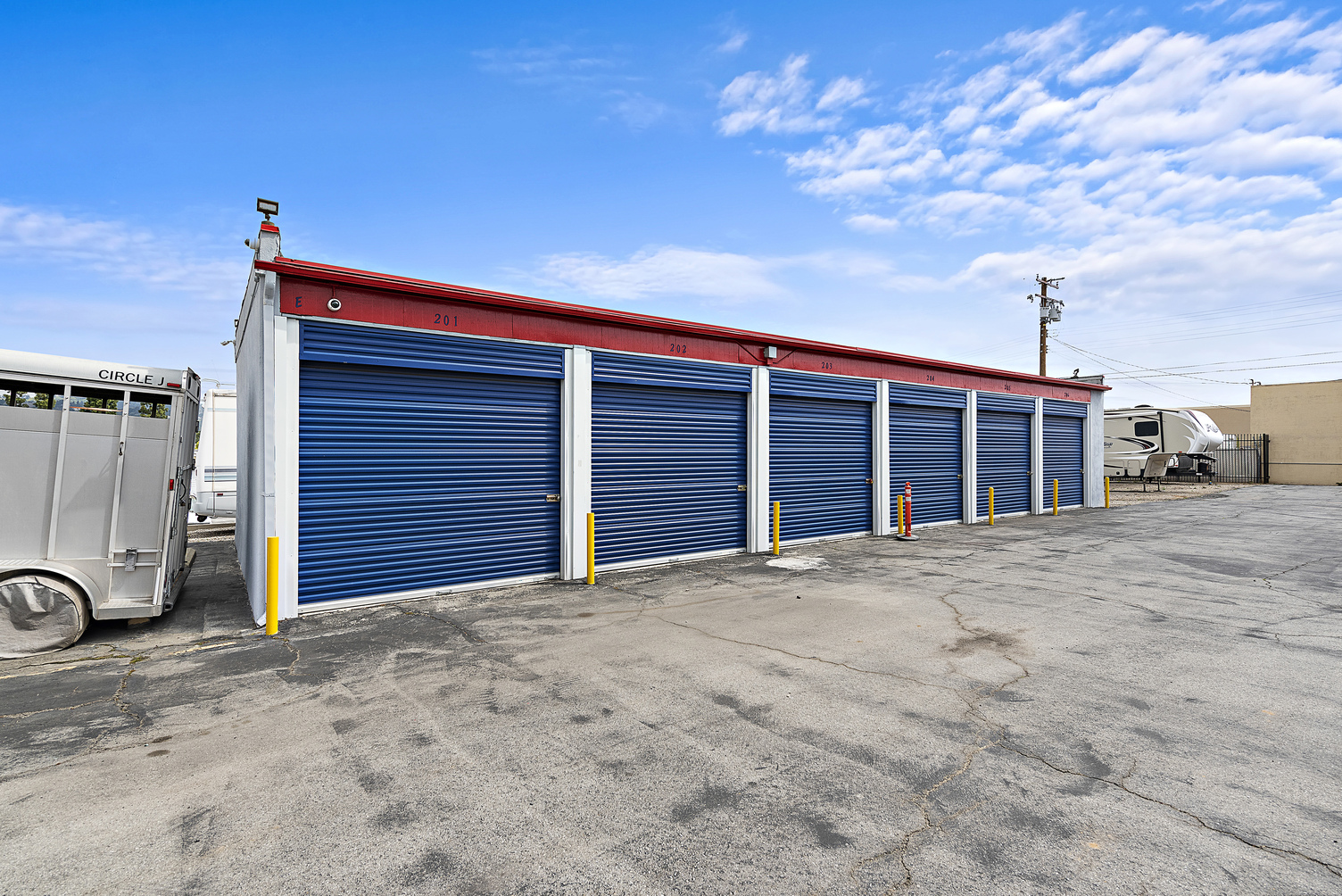 An exterior view of the Lamber RV & Self Storage units and their entry doors.