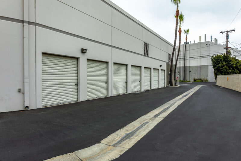 A row of outdoor storage units at Garden Grove Secured Storage.